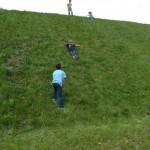 Kids Sliding down The Hill