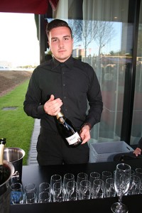 Idris Harput Serving Champagne